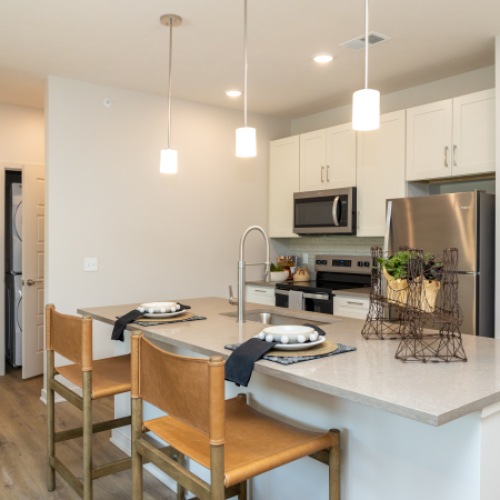 Beautiful kitchens with designer finishes kitchen with white cabinets and stainless steel appliances
